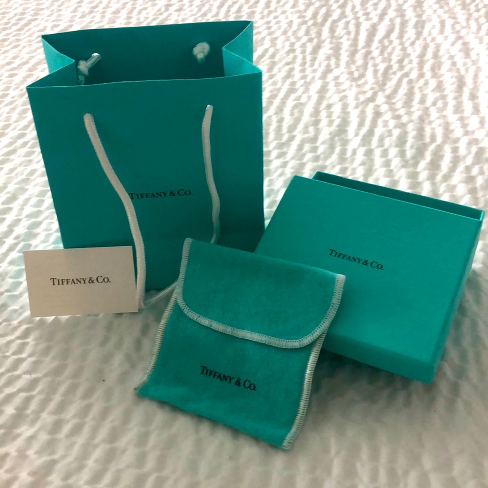 Beautiful Tiffany blue boxes with the pouch original and authentic